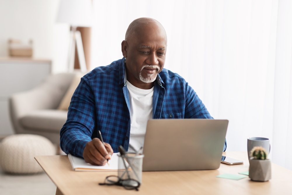 man researching mohs surgery vs traditional skin cancer removal in GA